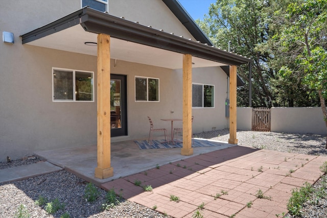 7 Corte De Canoncito, Cedar Crest, NM 87008 - view of patio / terrace featuring a gate