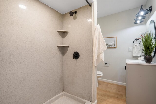 7 Corte De Canoncito, Cedar Crest, NM 87008 - bathroom featuring vanity, a shower, and wood finished floors