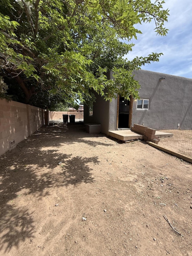 98 Rancho Pequenos Way, Albuquerque, NM 87114 - rear view of house with stucco siding
