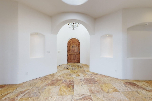 3 Quiet Ln, Corrales, NM 87048 - entrance foyer featuring arched walkways and a chandelier