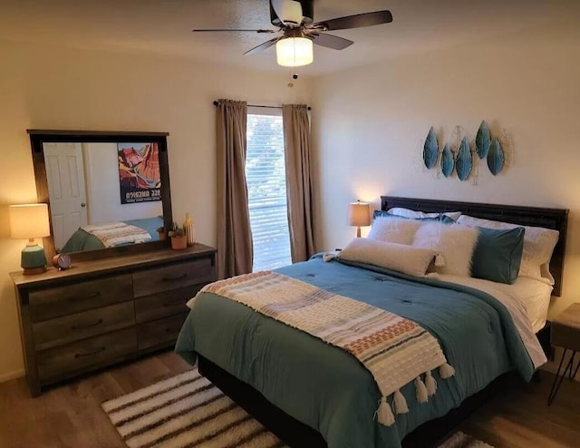 4601 Carlisle Blvd NE Unit H-2, Albuquerque, NM 87109 - bedroom featuring wood finished floors and ceiling fan
