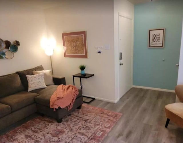 4601 Carlisle Blvd NE Unit H-2, Albuquerque, NM 87109 - living area featuring wood finished floors and baseboards