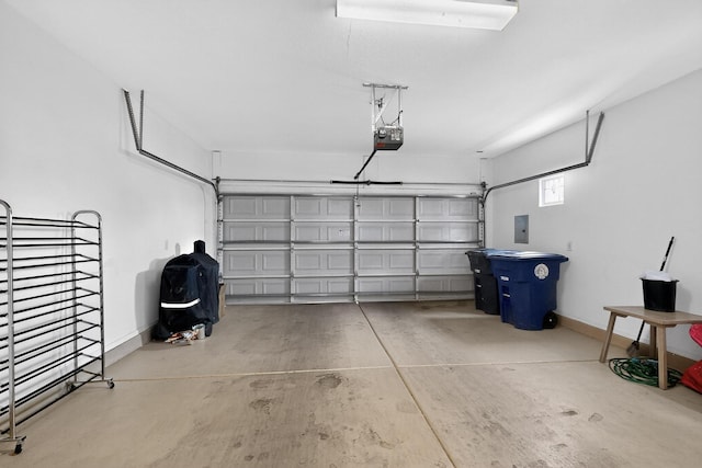 6021 Alamosa Way NW, Albuquerque, NM 87107 - garage with electric panel and a garage door opener