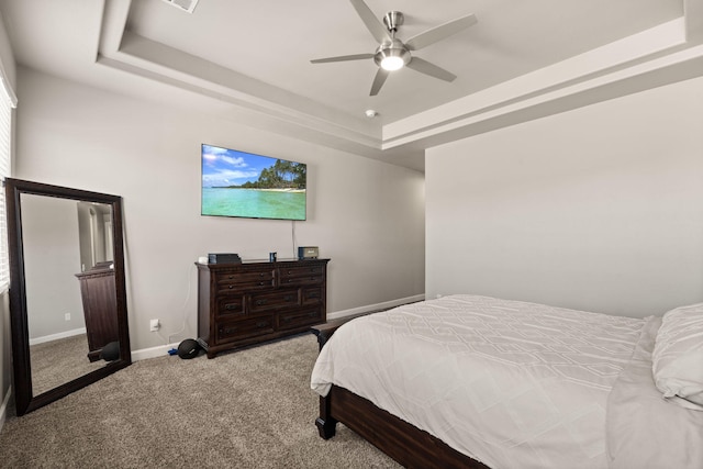 6873 Cleary Loop NE, Rio Rancho, NM 87144 - carpeted bedroom with a tray ceiling and ceiling fan