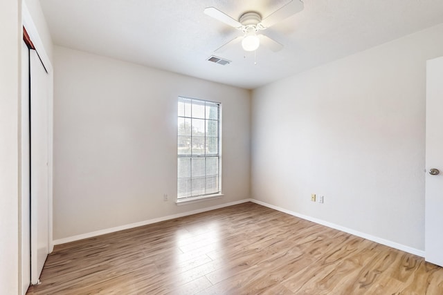 4807 Parsifal St NE, Albuquerque, NM 87111 - unfurnished bedroom featuring light wood finished floors, a closet, and a ceiling fan