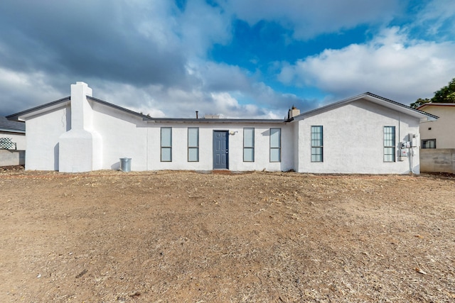 4807 Parsifal St NE, Albuquerque, NM 87111 - rear view of house with stucco siding