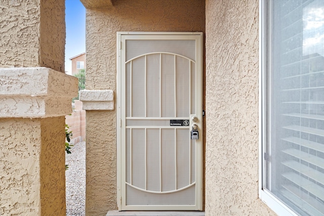 5443 Reserve Ct NE, Rio Rancho, NM 87144 - property entrance with stucco siding