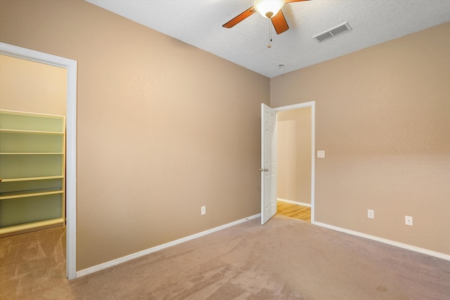 5443 Reserve Ct NE, Rio Rancho, NM 87144 - unfurnished bedroom with carpet floors, a ceiling fan, and a closet
