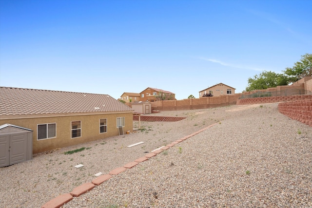 5443 Reserve Ct NE, Rio Rancho, NM 87144 - fenced backyard featuring a shed
