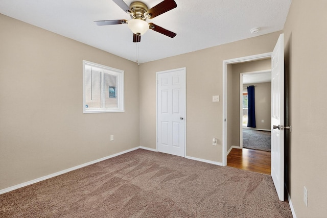 6312 Zimmerman Ave NE, Albuquerque, NM 87110 - unfurnished bedroom featuring carpet flooring and ceiling fan