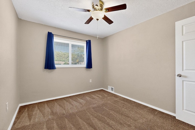 6312 Zimmerman Ave NE, Albuquerque, NM 87110 - spare room featuring carpet, ceiling fan, and a textured ceiling