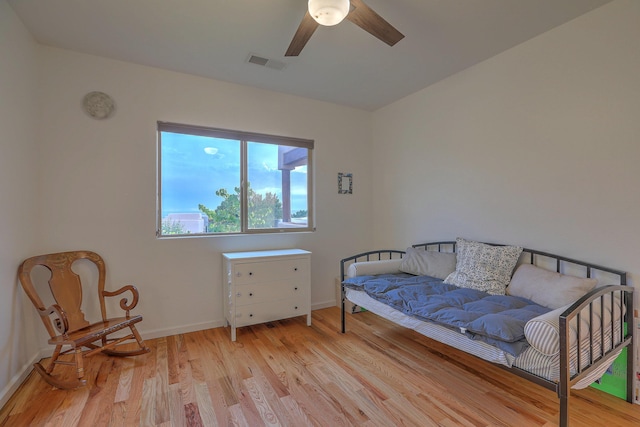 9404 Bear Mountain Trl NE, Albuquerque, NM 87113 - bedroom featuring light wood-style flooring and ceiling fan