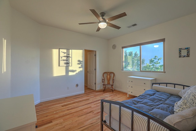 9404 Bear Mountain Trl NE, Albuquerque, NM 87113 - bedroom with light wood-type flooring and a ceiling fan