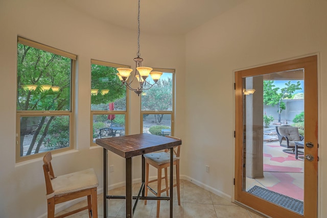 9404 Bear Mountain Trl NE, Albuquerque, NM 87113 - dining room with a chandelier and light tile patterned flooring