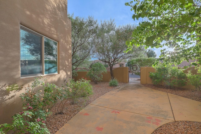 9404 Bear Mountain Trl NE, Albuquerque, NM 87113 - view of patio / terrace with a gate