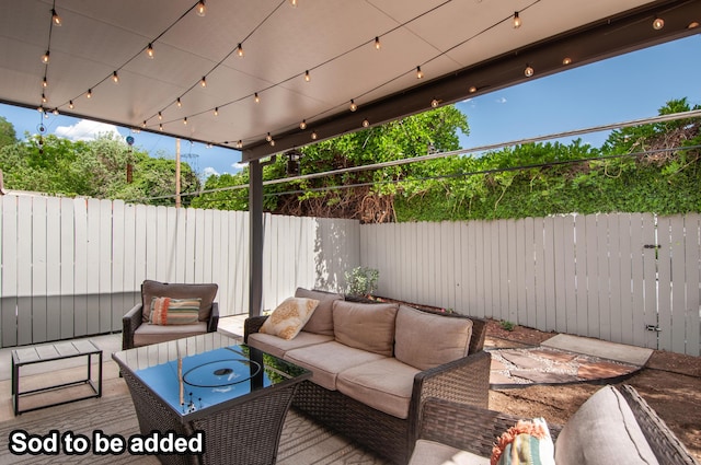 6820 Los Trechos Ct NE, Albuquerque, NM 87109 - fenced backyard featuring an outdoor living space and a patio area