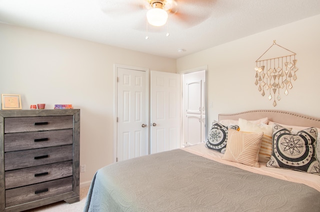 6820 Los Trechos Ct NE, Albuquerque, NM 87109 - bedroom featuring carpet and a ceiling fan