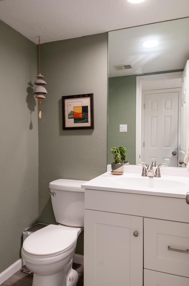 6820 Los Trechos Ct NE, Albuquerque, NM 87109 - bathroom with vanity and toilet