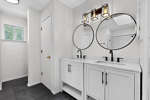 4429 Cattleya Rd NW, Albuquerque, NM 87120 - bathroom featuring double vanity and tile patterned flooring