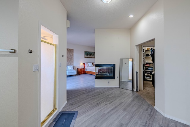 3700 Alamogordo Dr NW, Albuquerque, NM 87120 - hall featuring light wood-style floors and baseboards