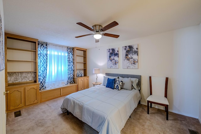 3700 Alamogordo Dr NW, Albuquerque, NM 87120 - bedroom featuring light carpet and ceiling fan