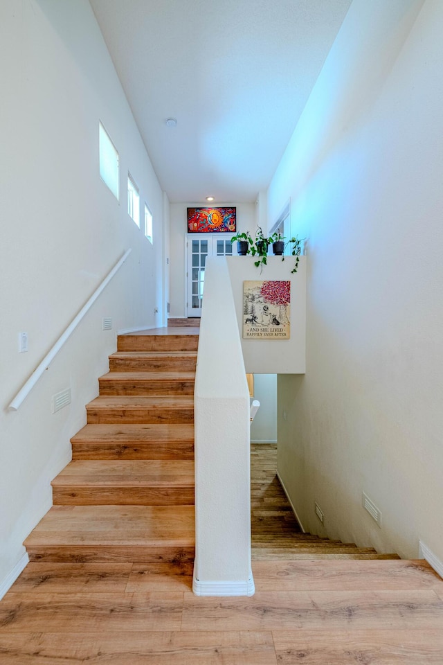 3700 Alamogordo Dr NW, Albuquerque, NM 87120 - stairway with wood finished floors