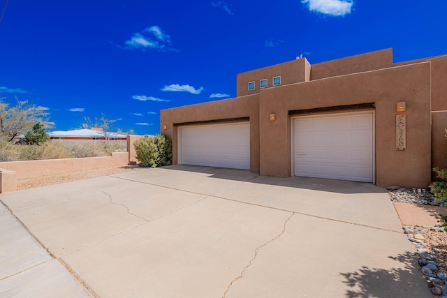 3700 Alamogordo Dr NW, Albuquerque, NM 87120 - garage featuring driveway