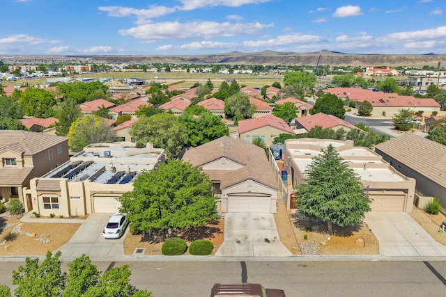 3915 Tundra Swan Ct NW, Albuquerque, NM 87120 - aerial perspective of suburban area with mountains