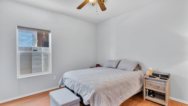 3915 Tundra Swan Ct NW, Albuquerque, NM 87120 - bedroom featuring wood finished floors and a ceiling fan