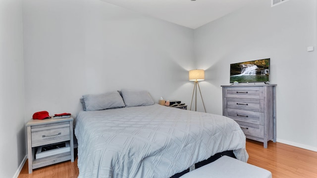 3915 Tundra Swan Ct NW, Albuquerque, NM 87120 - bedroom featuring light wood finished floors and baseboards