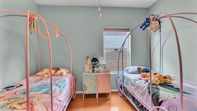3915 Tundra Swan Ct NW, Albuquerque, NM 87120 - bedroom with wood finished floors and baseboards