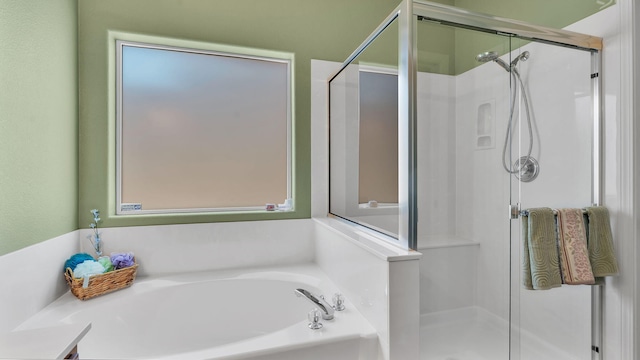 3915 Tundra Swan Ct NW, Albuquerque, NM 87120 - full bathroom with a stall shower and a bath