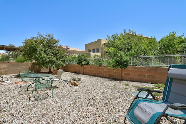 640 Renaissance Loop SE, Rio Rancho, NM 87124 - fenced backyard with a patio