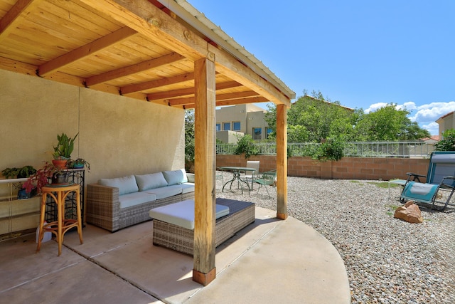 640 Renaissance Loop SE, Rio Rancho, NM 87124 - view of patio / terrace featuring an outdoor hangout area