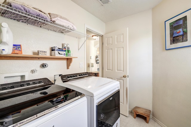 640 Renaissance Loop SE, Rio Rancho, NM 87124 - washroom featuring separate washer and dryer and baseboards
