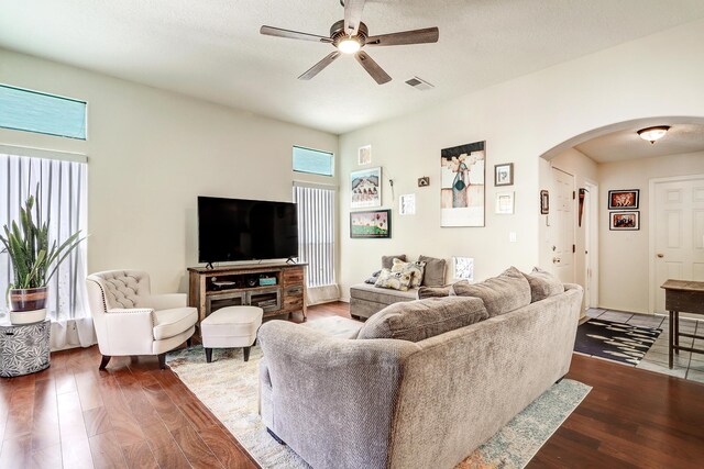 640 Renaissance Loop SE, Rio Rancho, NM 87124 - living room featuring arched walkways, a ceiling fan, and wood finished floors