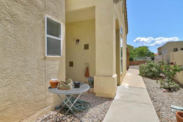 640 Renaissance Loop SE, Rio Rancho, NM 87124 - property entrance featuring stucco siding