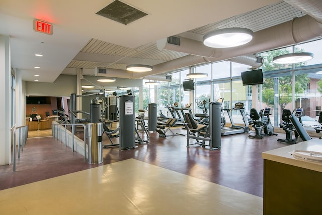 5402 Grays Peak Trl NE, Rio Rancho, NM 87144 - gym with expansive windows and recessed lighting