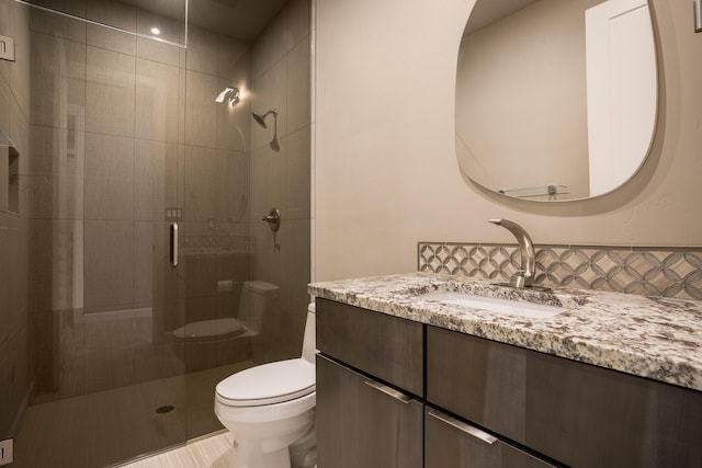 5402 Grays Peak Trl NE, Rio Rancho, NM 87144 - full bath featuring a stall shower, vanity, and decorative backsplash