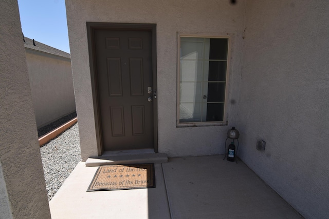 10812 Caresso SW, Albuquerque, NM 87121 - view of exterior entry featuring stucco siding