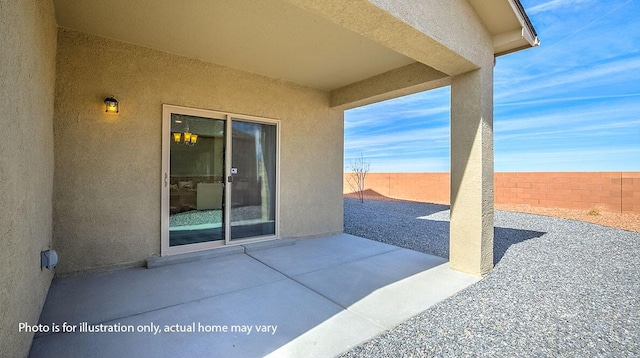 1652 Maggie Ct NE, Rio Rancho, NM 87144 - fenced backyard with a patio area
