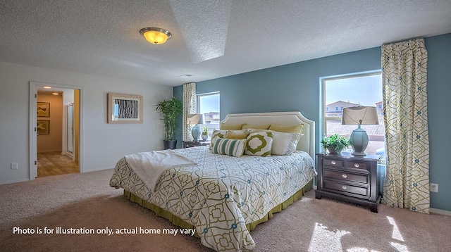1652 Maggie Ct NE, Rio Rancho, NM 87144 - bedroom with carpet flooring and a textured ceiling