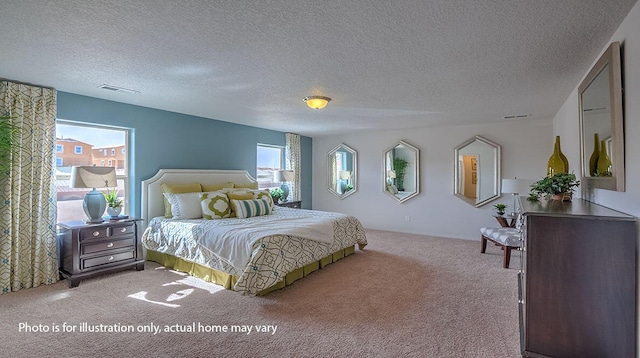 1652 Maggie Ct NE, Rio Rancho, NM 87144 - bedroom featuring carpet floors and a textured ceiling