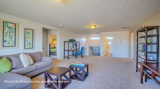 1652 Maggie Ct NE, Rio Rancho, NM 87144 - living room featuring carpet flooring and a textured ceiling