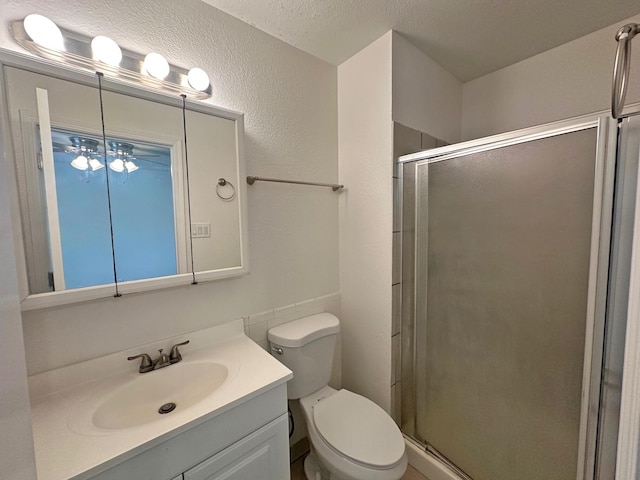 5612 Territorial Rd NW, Albuquerque, NM 87120 - full bath with vanity, a shower stall, and a textured wall