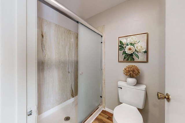 9815 Osuna Rd NE, Albuquerque, NM 87111 - bathroom with a shower stall and wood finished floors