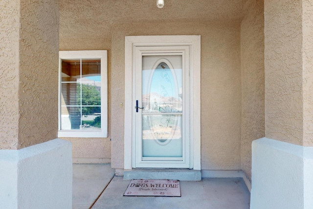 4249 Montera Pl NW, Albuquerque, NM 87114 - view of exterior entry featuring stucco siding