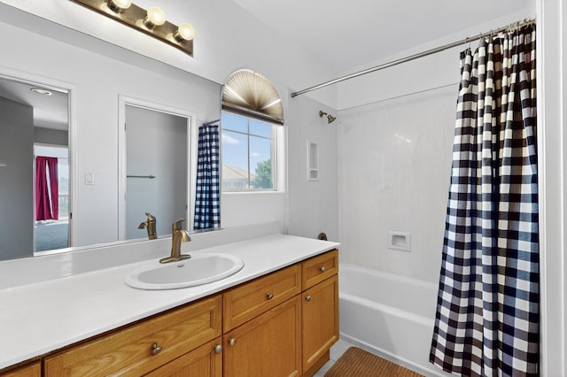 4249 Montera Pl NW, Albuquerque, NM 87114 - bathroom with vanity and shower / bathtub combination with curtain