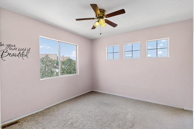 4249 Montera Pl NW, Albuquerque, NM 87114 - spare room with carpet floors and ceiling fan