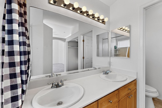 4249 Montera Pl NW, Albuquerque, NM 87114 - bathroom with toilet and double vanity